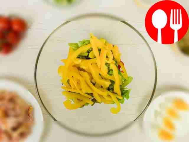 In a deep salad bowl, combine bell peppers and...