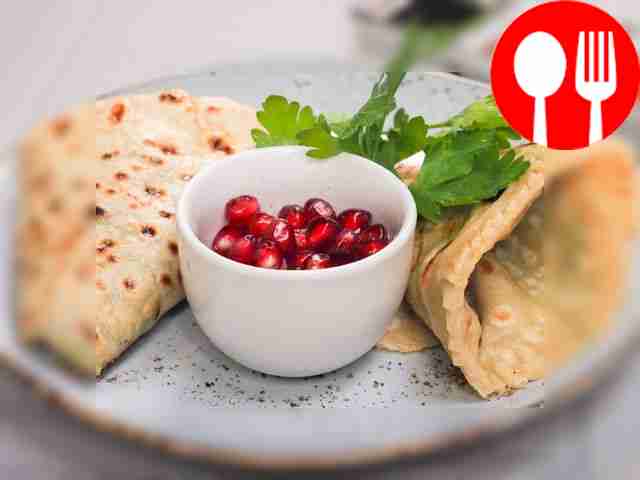 Kutaby with greens and suluguni