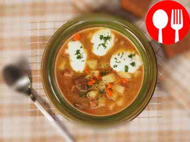 Pour the stew with meat and potatoes into...