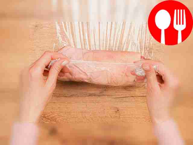 Form a pork knuckle into a roll. Place the...