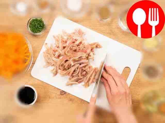 Slice the pork ears. Remove the cooked ears...