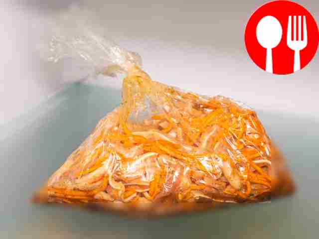 Marinate the ears. Add chopped carrots to the...