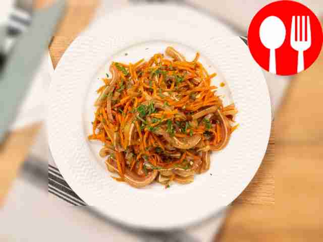 Before serving, garnish the Korean pork ears...