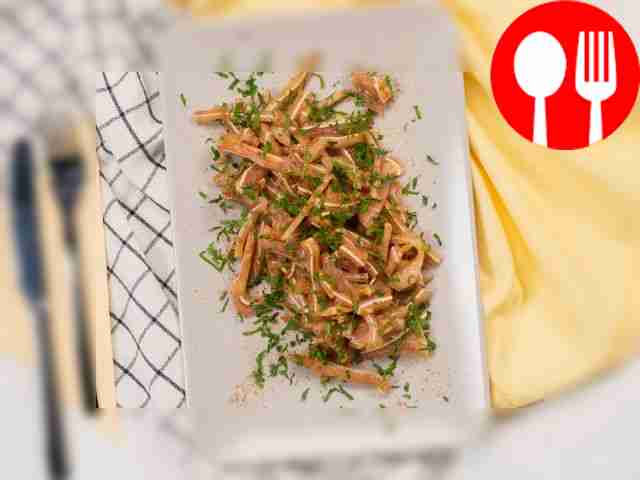 Sprinkle the marinated pork ears with chopped...