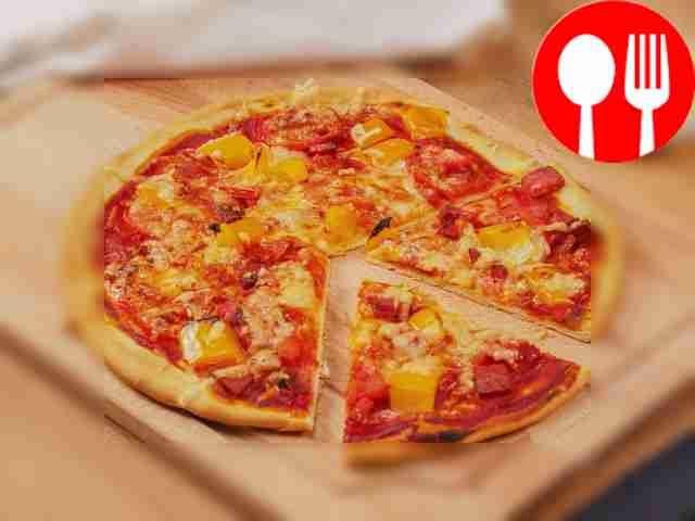 Pizza with cervelat and cheese on mayonnaise