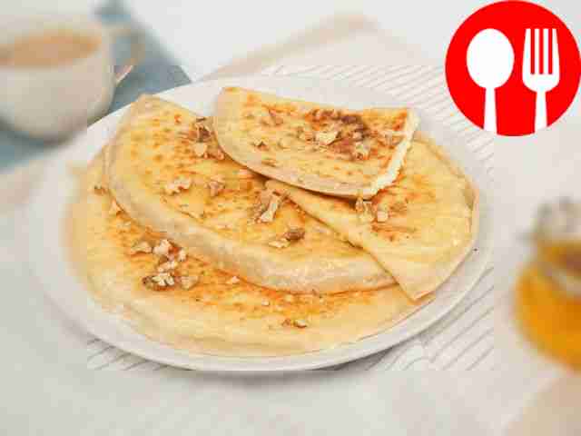 Azerbaijani kutabs with cottage cheese