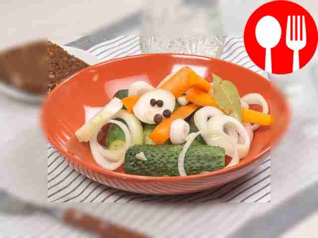 Pickled cucumbers with onions