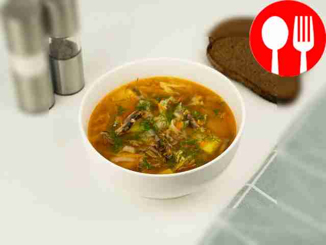 Cabbage soup with sprat in tomato sauce