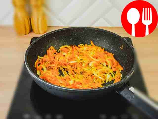 Обжарьте лук и морковь на заранее разогретой...