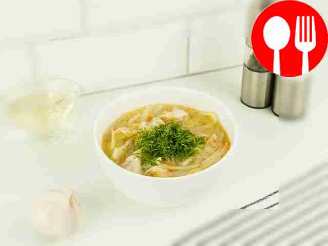 Cabbage soup in a slow cooker with chicken