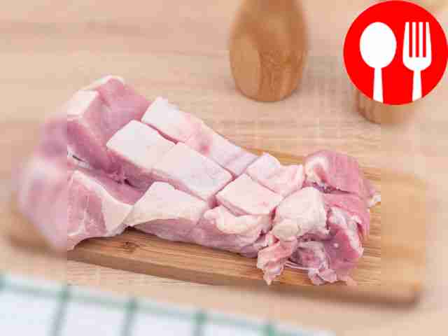 Make criss-cross cuts into the pork.