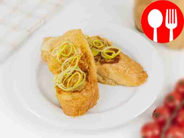 Toasts with egg and milk in a frying pan