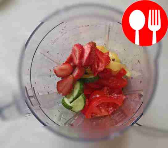 Add strawberries and chopped basil leaves,...