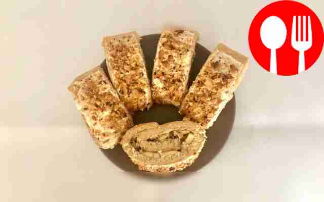 Sweet roll with condensed milk and nuts