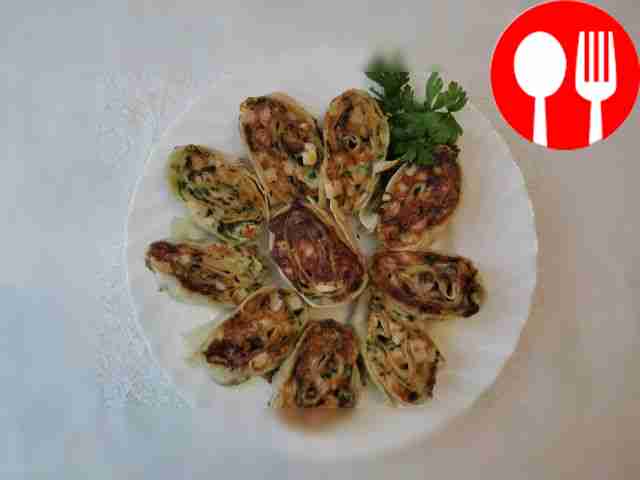 Lavash with smoked chicken in a frying pan