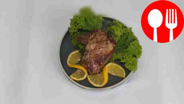 Pork steak with garlic and lemon