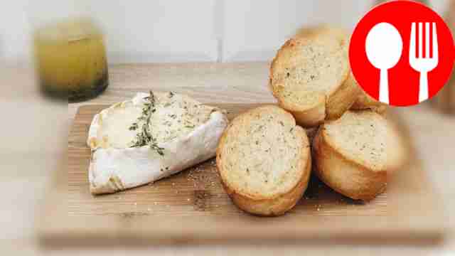 Brie cheese in the oven with croutons