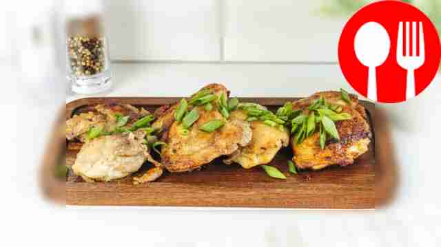 Chicken thighs in a frying pan