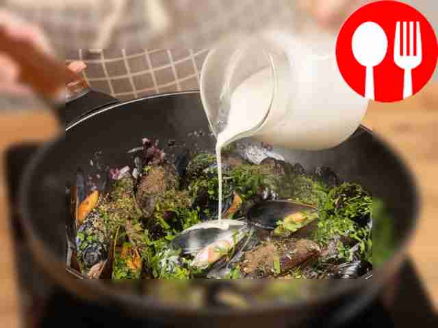 Fry the mussels. Turn up the heat under the...