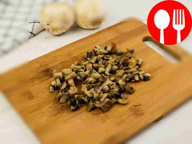 Cut the mushrooms into small cubes or thin...