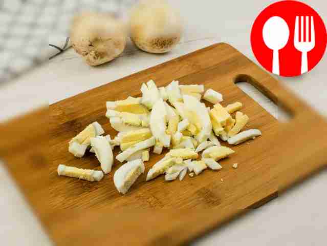 Cut boiled chicken eggs into small cubes, or...