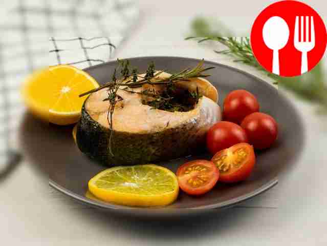 Salmon steak with orange and herbs