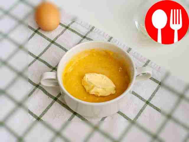 Pour melted butter into the dough.