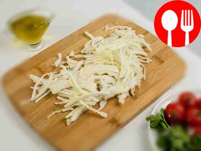 Chop the cabbage into thin strips.