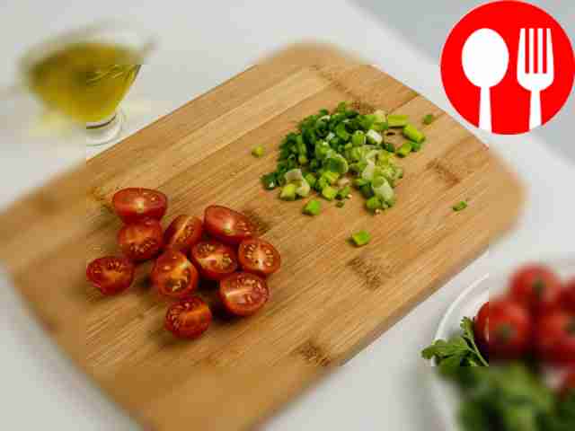 Finely chop the green onions and cut the...