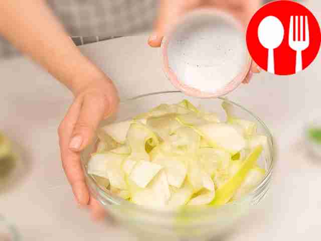 Prepare the zucchini. Use a vegetable slicer...