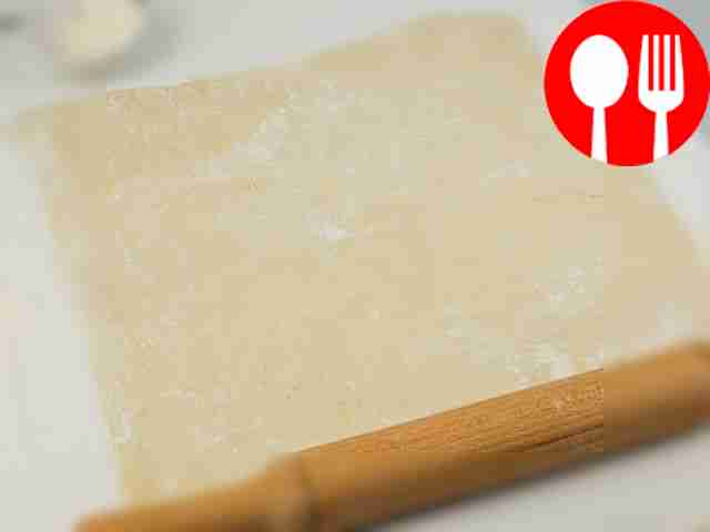 Dust the table with flour and roll out the...