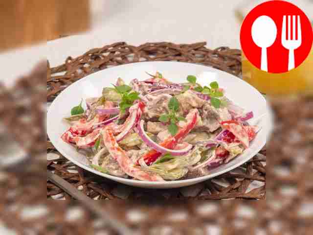 Simple salad with beef and pickled cucumbers