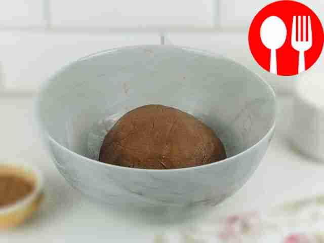 Knead the dough until it begins to pull away...