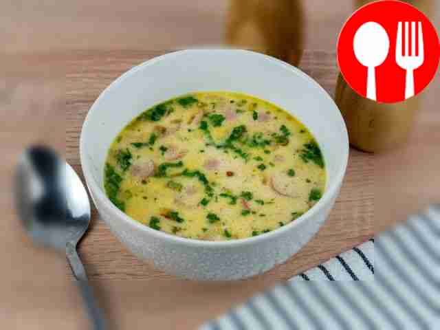 Cheese soup with sausages
