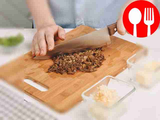 Cut the champignons and pickled mushrooms into...