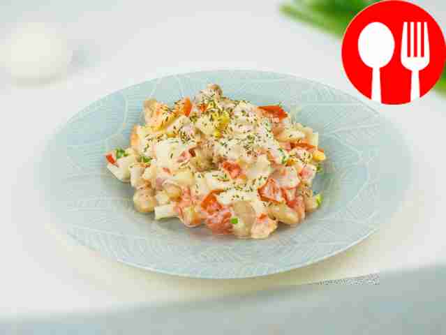 Crab stick salad with canned beans and eggs