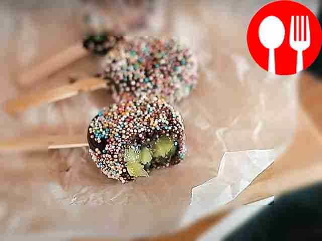 Kiwi in chocolate on a stick