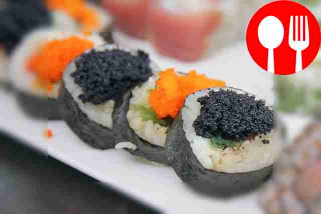Large roll with salmon and caviar