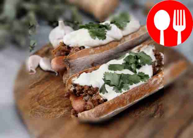 Hot dogs with cheese sauce