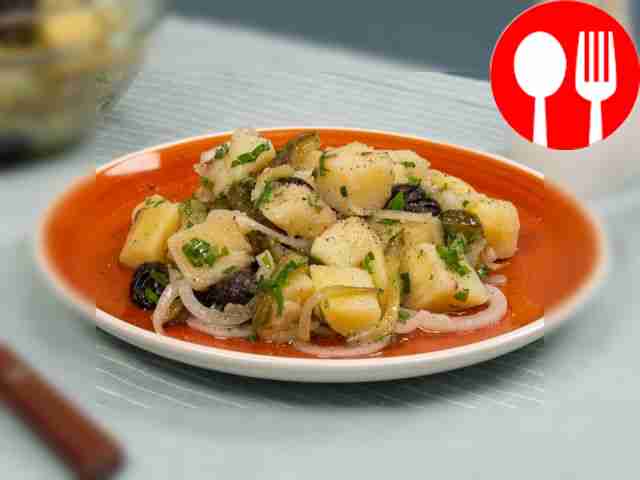 Salad with potatoes and pickled cucumbers