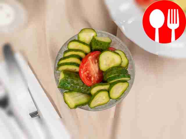 Serve pickled cucumbers and tomatoes as an...