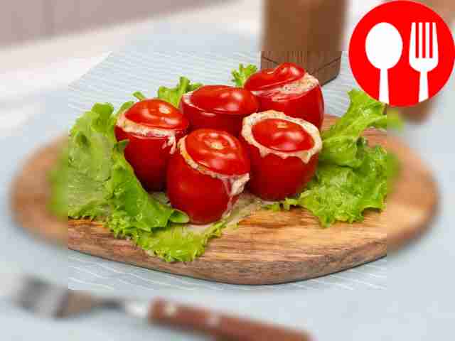 Tomatoes stuffed with cheese in the oven