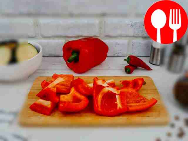 Remove the stem and seeds from the pepper. Cut...