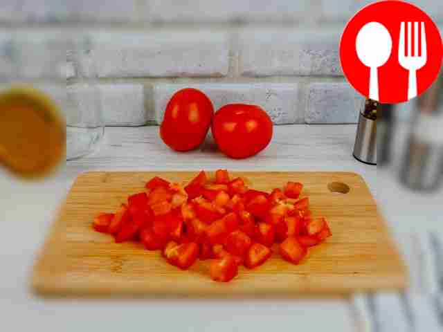 Cut the tomatoes into small cubes.