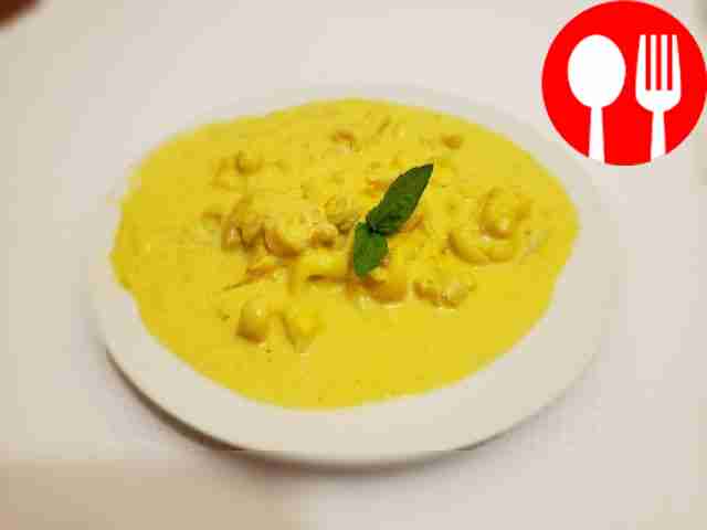 Кальмар под сырным соусом в пяти специях