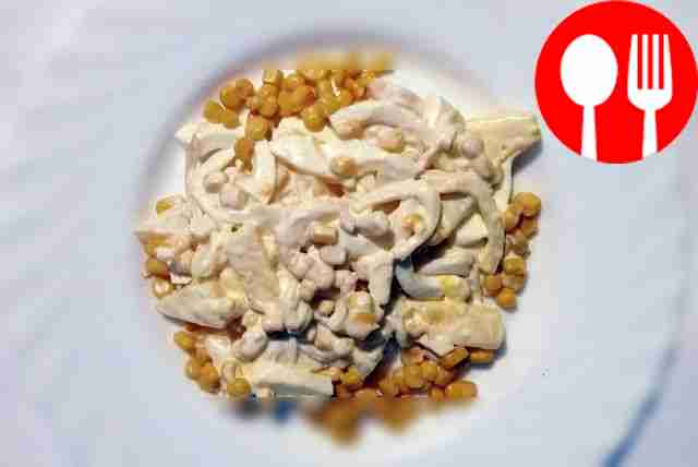 Original salad with squid and pineapple