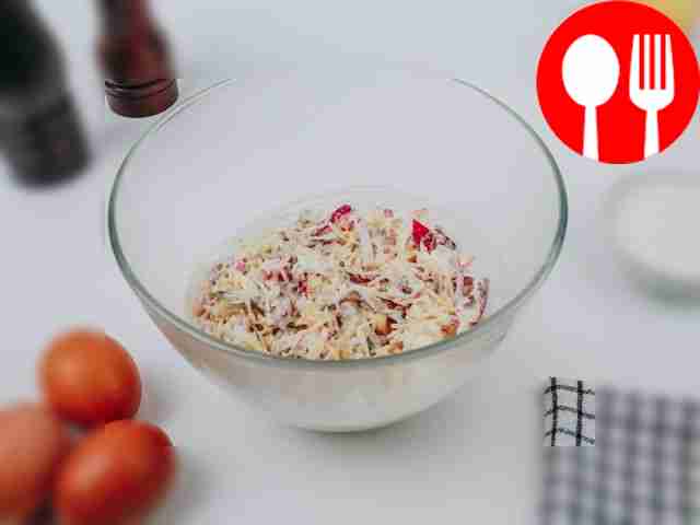 Mix the salad thoroughly and garnish it with...