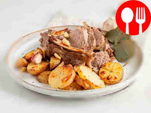 Fragrant lamb shoulder baked with potato wedges