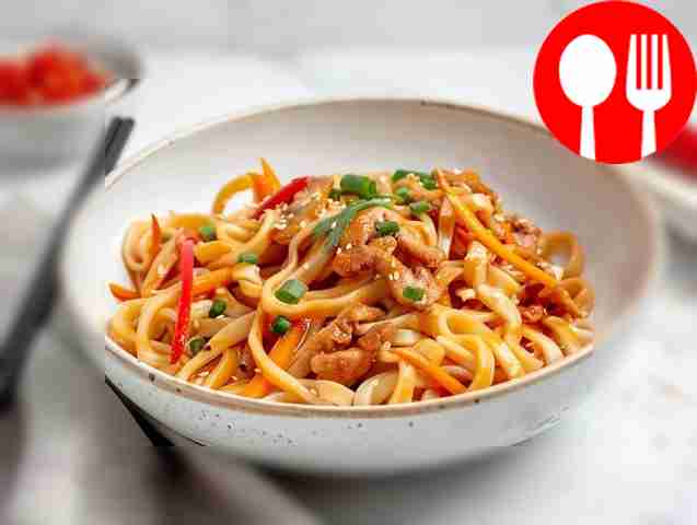 Japanese udon noodles with zucchini and chicken fillet