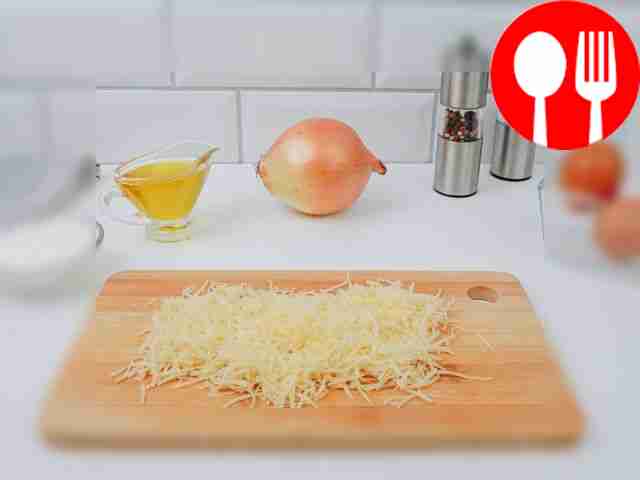 Grate the cheese on a fine grater.